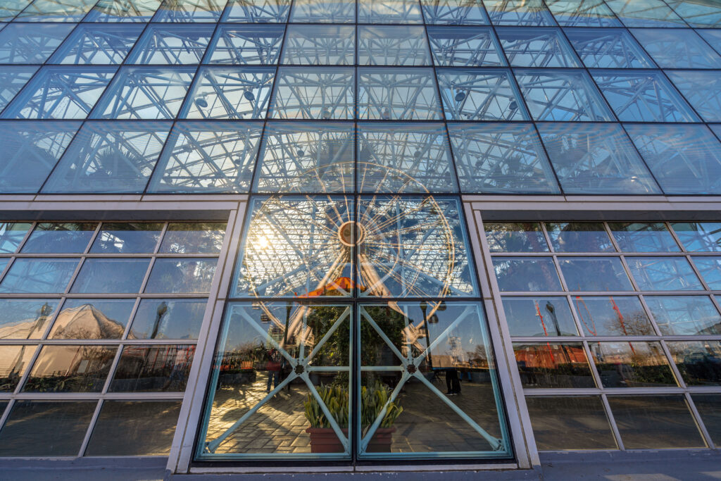 Navy pier ferris wheel reflection with windows glasses