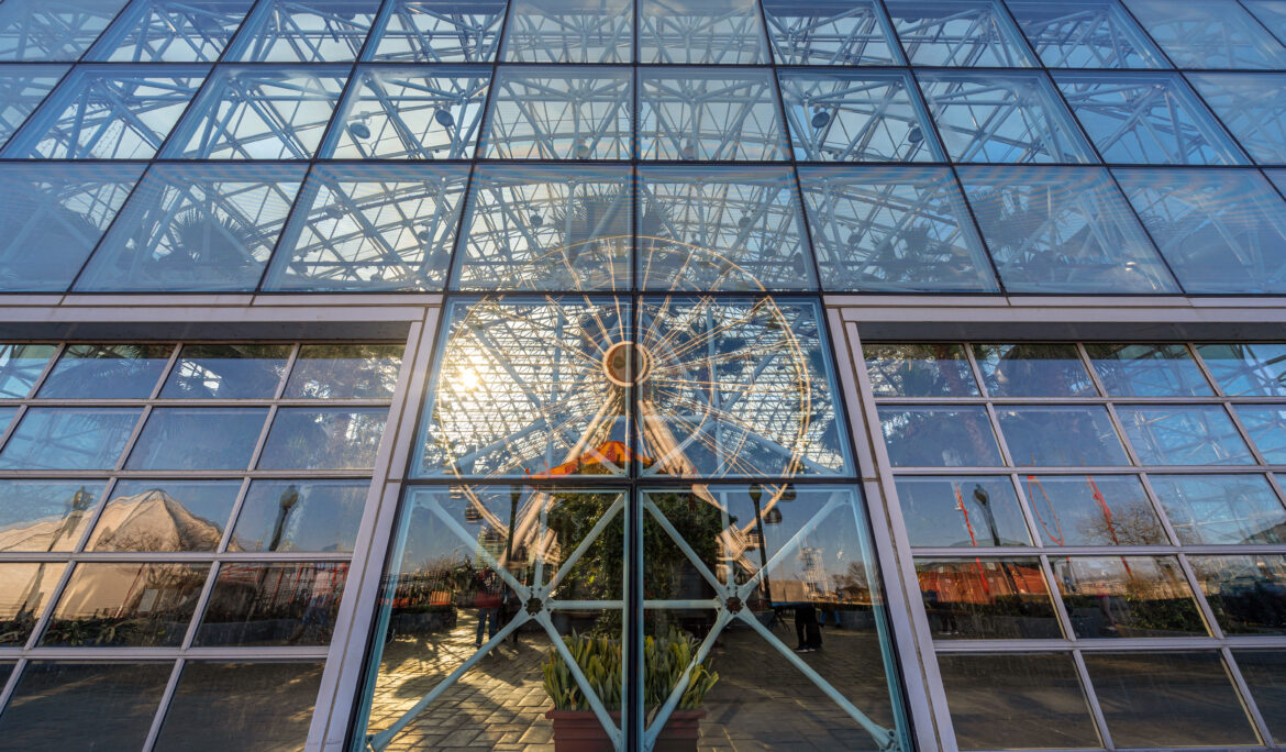 Navy pier ferris wheel reflection with windows glasses
