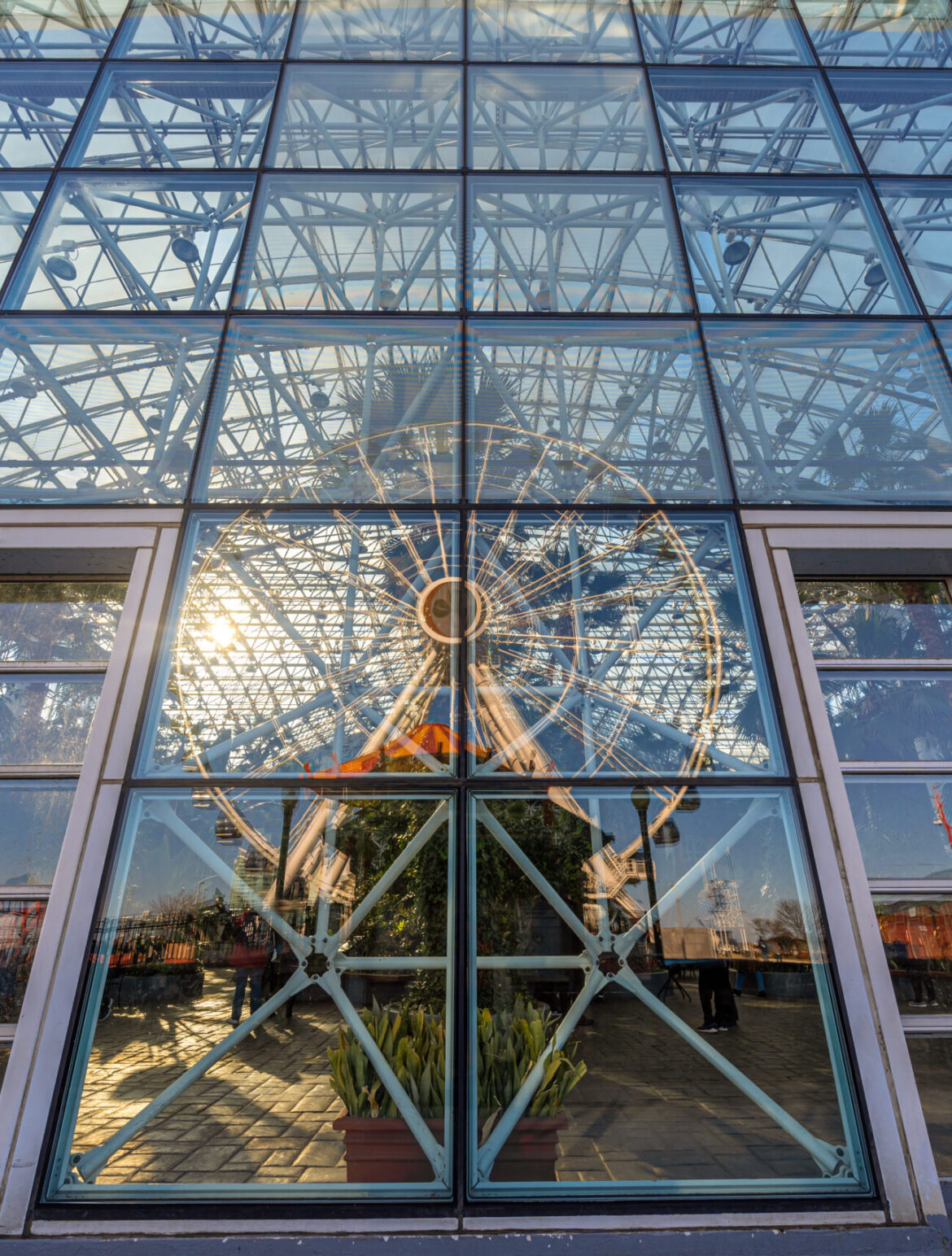 Navy pier ferris wheel reflection with windows glasses