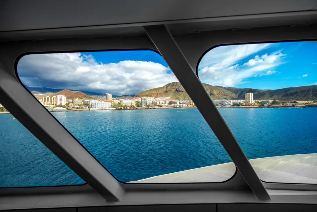 Yacht and resort view through marine glass